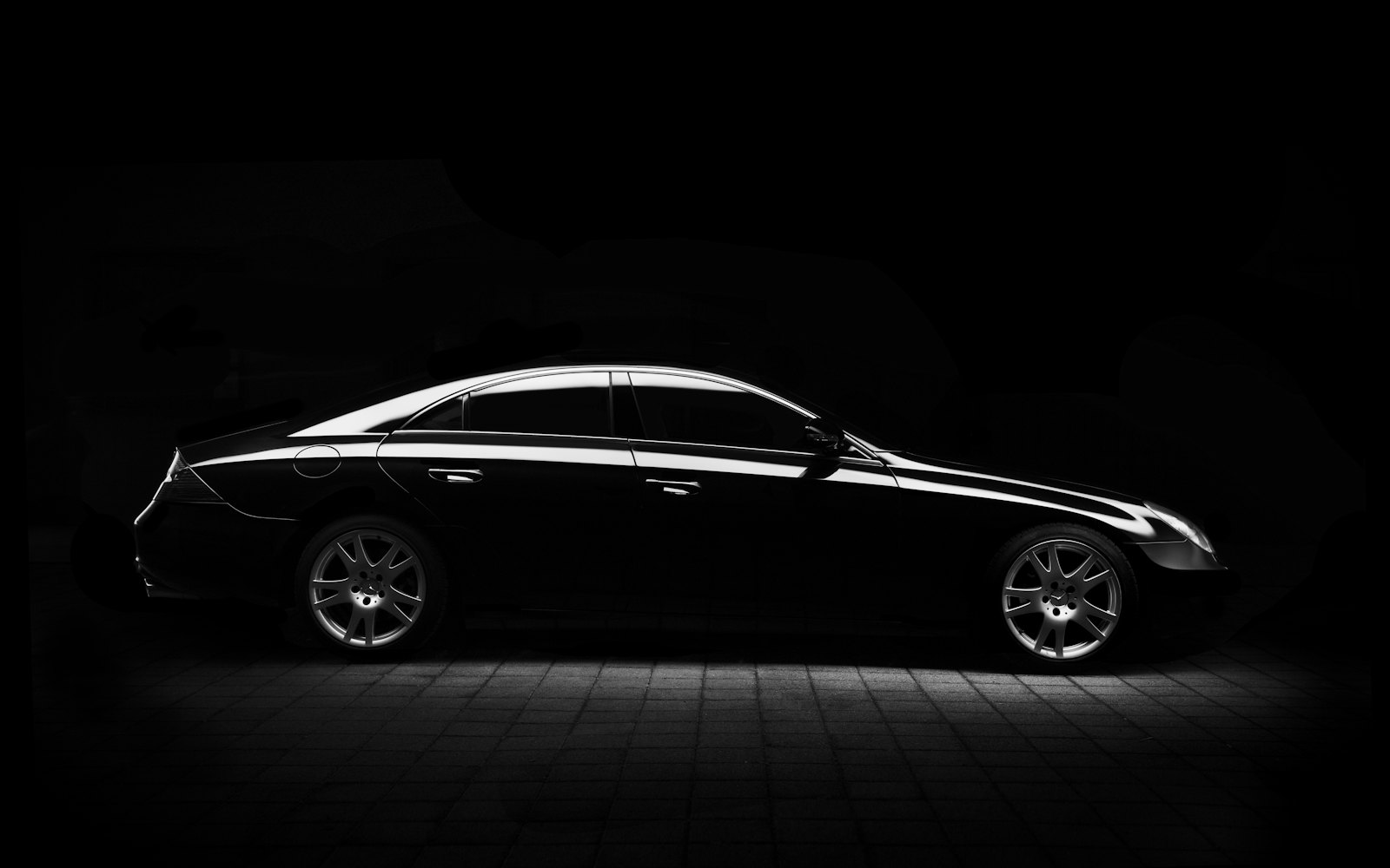 Car under garage lights